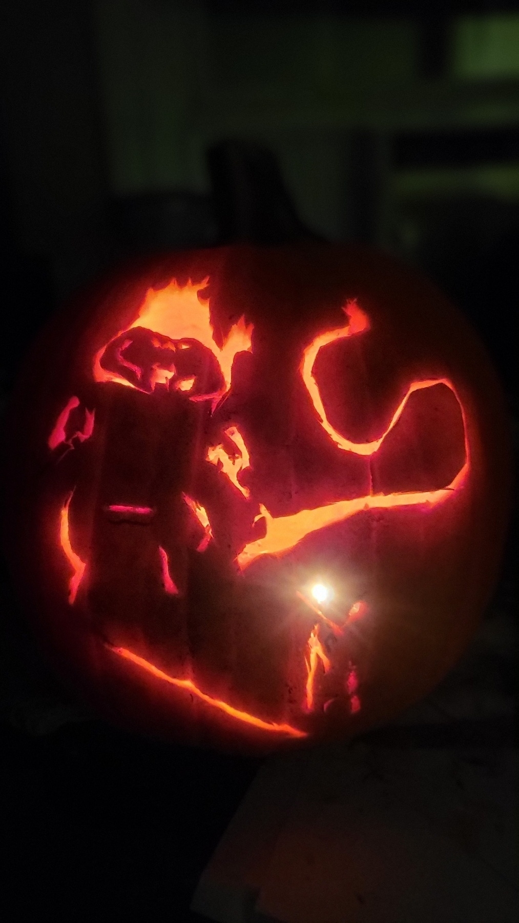 The same pumpkin, from an angle such that the candle shines out of Gandalf's staff. Cool effect!