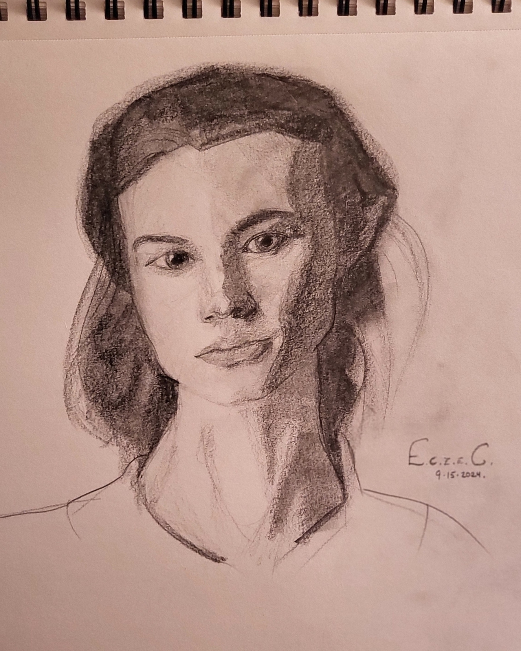 Graphite portrait of a young woman